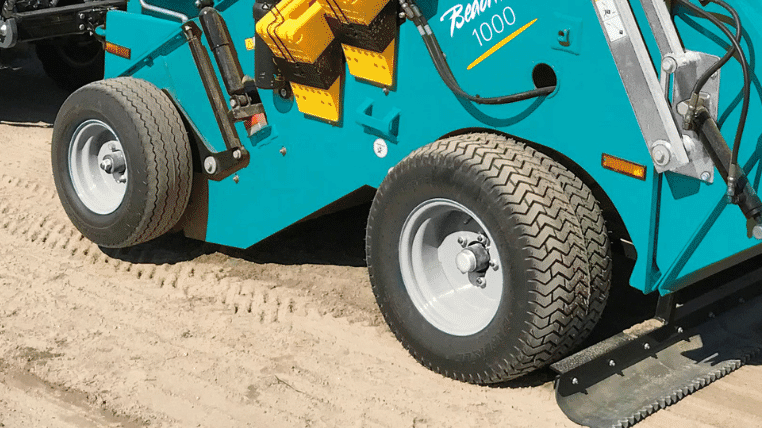 Towed beach cleaner BeachTech 1000 close up of tires