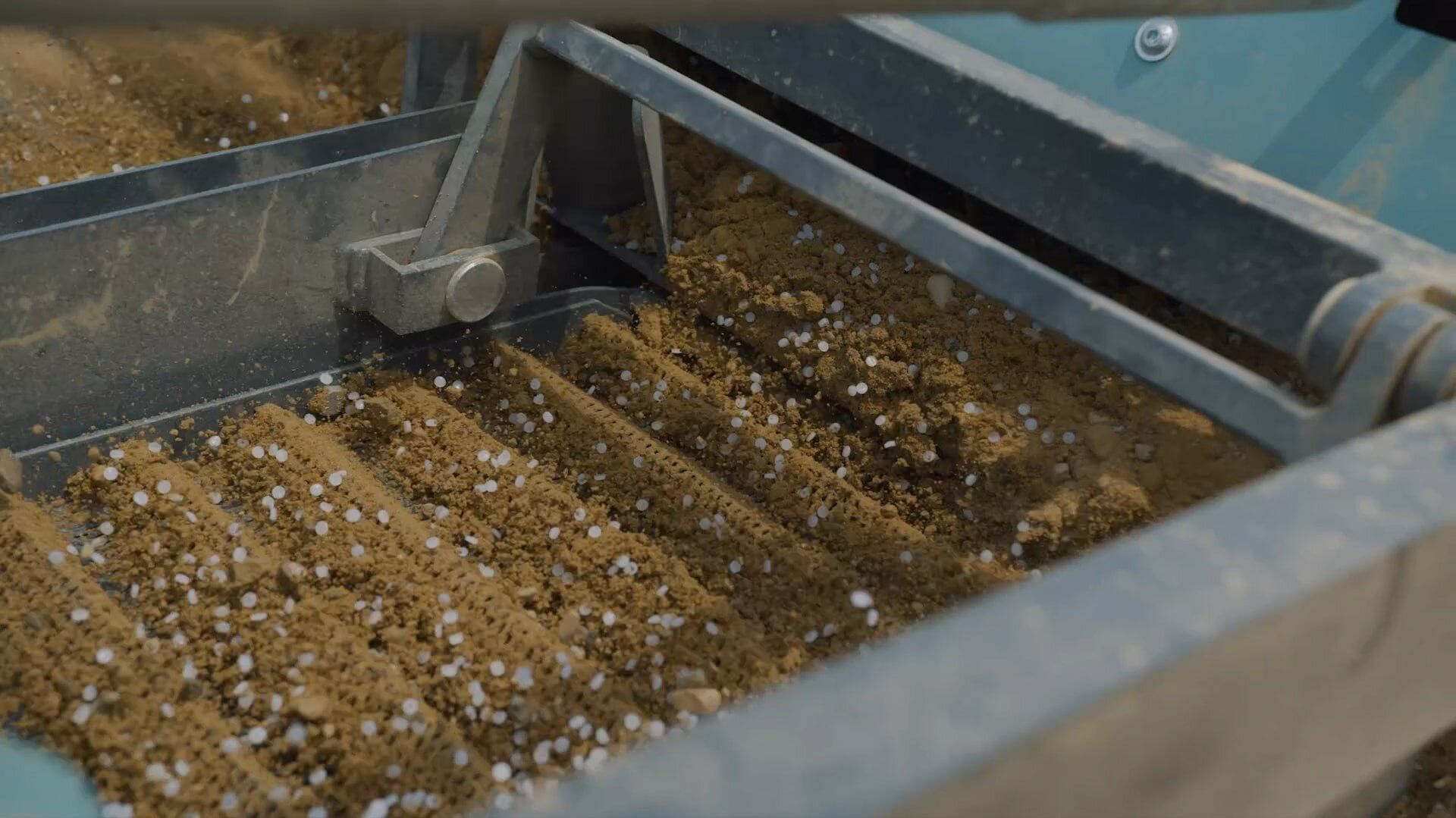 The screening belt of a BeachTech beach cleaner, which sieves nurdles out of the sand.